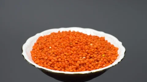 Lentils. Heap of raw uncooked red lentils in bowl. Stock Footage 102478700