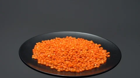 Lentils. Heap of raw uncooked red lentils in bowl. Stock Footage 102479255