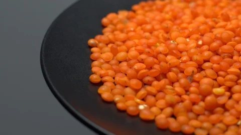 Lentils. Heap of raw uncooked red lentils in bowl. Stock Footage 102479294
