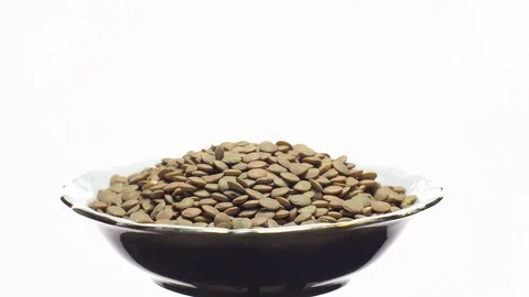 Lentils. Rotation. Close up. Heap of raw uncooked brown lentils. Stock Footage 102410915