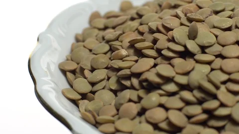 Lentils. Rotation. Close up. Heap of raw uncooked brown lentils. Stock Footage 102410988