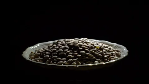 Lentils. Rotation. Close up. Heap of raw uncooked brown lentils. Stock Footage 102411688