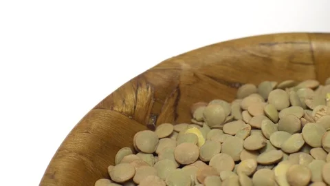Lentils. Rotation. Close up. Heap of raw uncooked brown lentils. Video stock 102413252