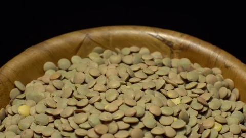 Lentils. Rotation. Close up. Heap of raw uncooked brown lentils. Stock Footage 102413474