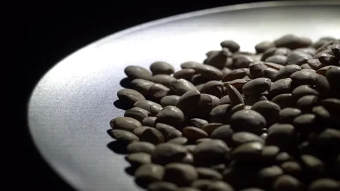 Lentils. Rotation. Close up. Heap of raw uncooked brown lentils. Video stock 102440480