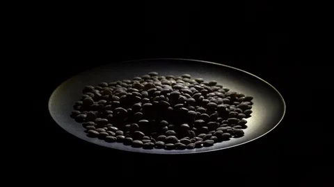 Lentils. Rotation. Close up. Heap of raw uncooked brown lentils. Video stock 102442171