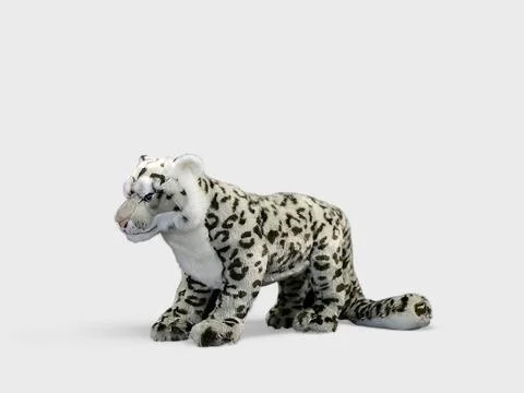 Leopard doll on a white background Stock Photos