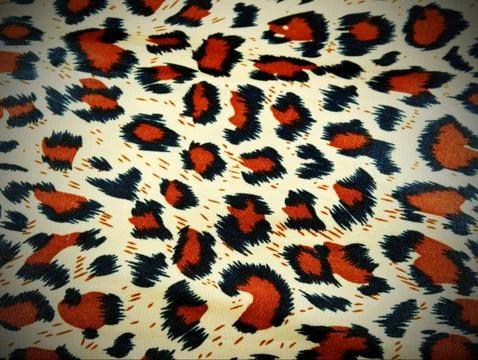 Leopard fabric as a background Stock Photos