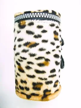 Leopard pattern pouch isolated on white background. Stock Photos