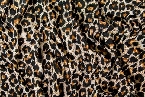 Leopard pattern texture. Textile, piece of clothes. Stock Photos