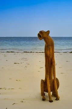 Leopard Sculpture on the sandy beach Stock Photos