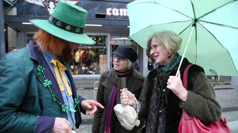 Leprechaun talking elderly females Stock Footage 61743953