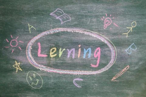 Lerning write on chalkboard Stock Photos