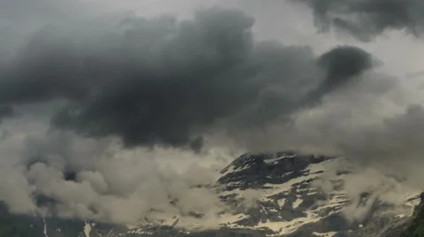 Les Diablerets high mountain landscape clouds covering peaks Stock Footage 52219651