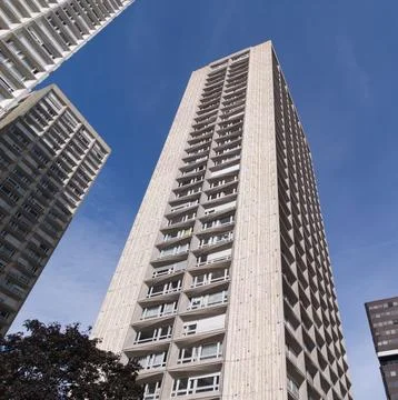 Les Olympiades complex brutalist architecture reaching blue sky Foto stock
