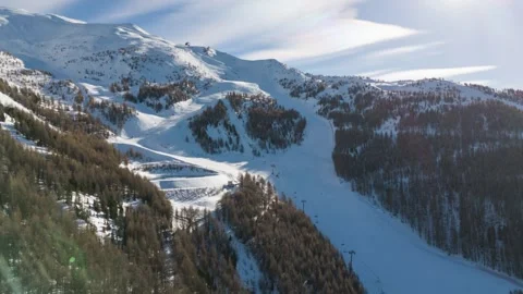 Les Orres aerial hyperlapse orbit shot Clos Sereis run ski area drone Stock Footage 267025908