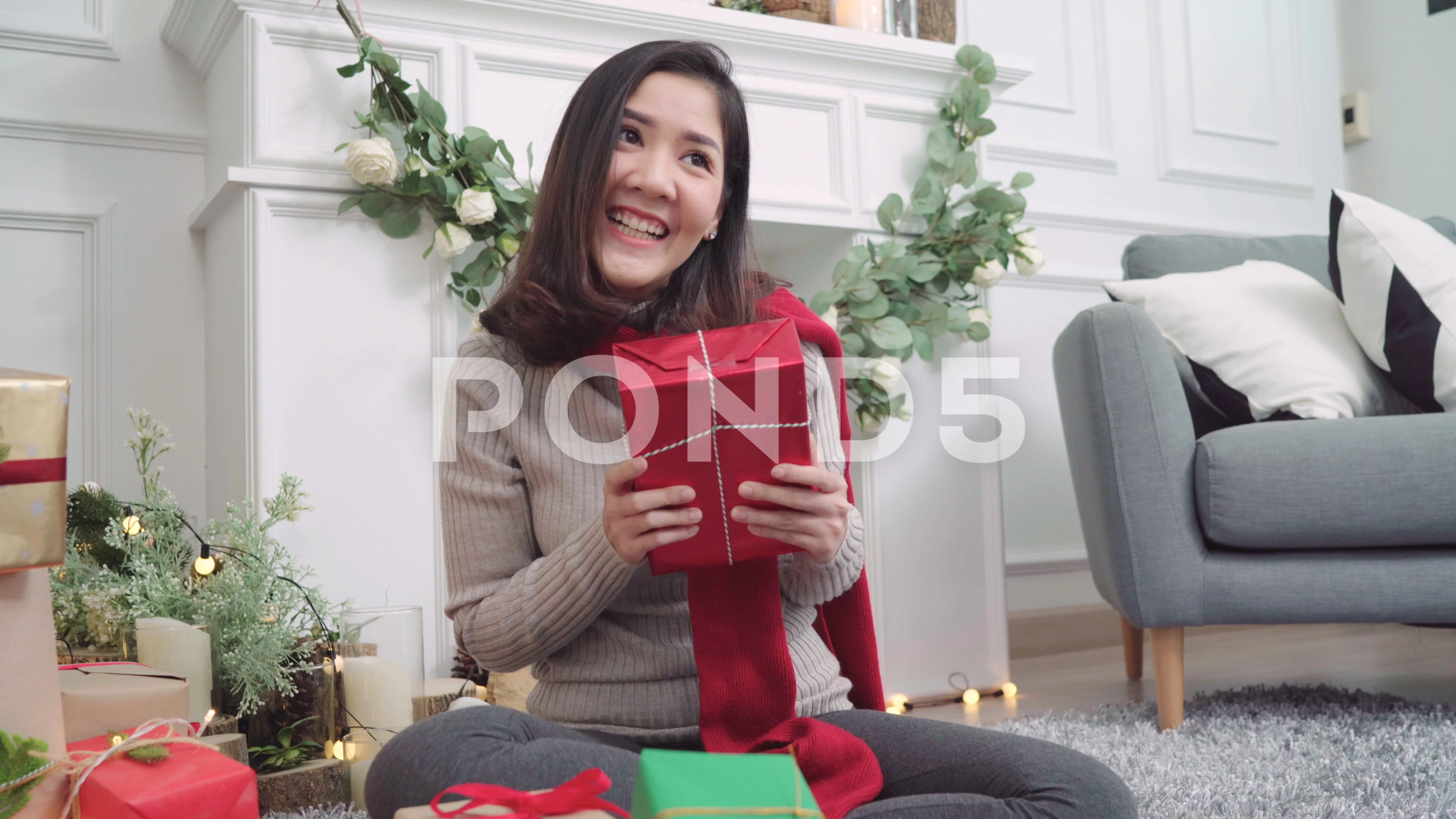 Lesbian Asian couple giving christmas gifts to each other in Christmas  Festival.