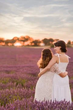 Lesbian engagement proposal. Wedding lgbtq couple love. Hispanic female young Stock Photos