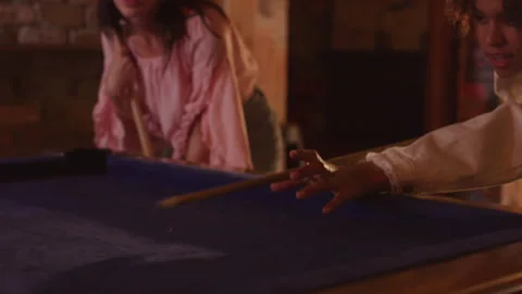 Lesbian partners playing pool at a local pub and having fun Stock Footage 262555350