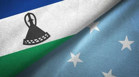 Lesotho and Micronesia two flags textile cloth, fabric texture Stock Illustration
