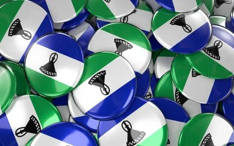 Lesotho Badges Background - Pile of Lesotho Flag Buttons. Illustrazione stock