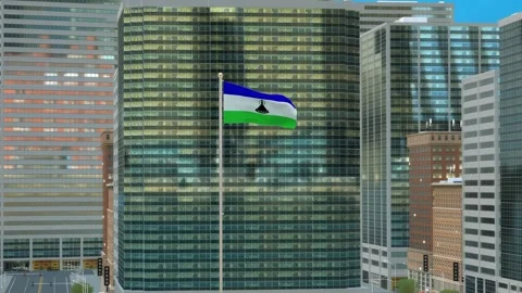 Lesotho Flag 3D Render Animation on Pole with Modern Business District Build Video stock 332882640