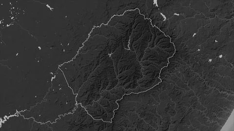 Lesotho outlined on a Grayscale elevation map with lakes and rivers Illustrazione stock