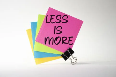 Less is More symbol. Sticky Notes with Concept words Less is More. Beautifu.. Stock Photos