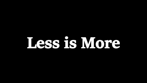 Less is More text on black background, minimalist typography design concept. Stock Footage 344928065