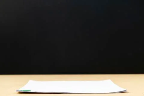 Less of Stack of document paper with colorful paperclip place on wooden table Stock Photos