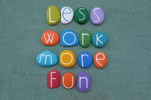 Less work, more fun, creative message composed with multicolored stone letters Stock Photos