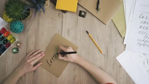 Lesson 1 Hand is Writing with Brush Pen in Calligraphy Way Stock Footage 148694777
