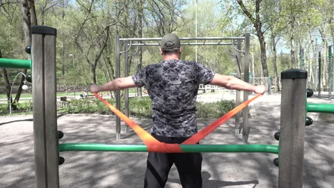 Lesson with expander in the Park 4K Stock-Footage 90683834