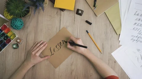 Lesson tree Writing In A Craft Paper in Hand Lettering Way Stock Footage 148694910