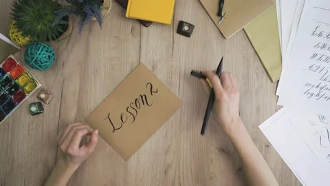 Lesson two Writing In A Craft Card In Calligraphy Form Stock Footage 148694853
