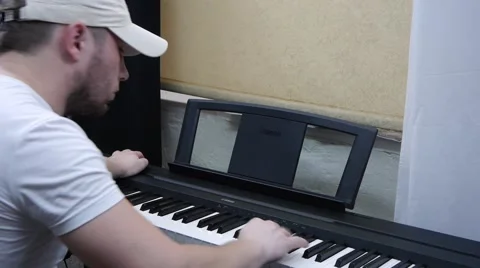 Lessons on the piano Stock Footage 64274681