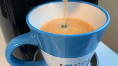 Let coffee out of a coffee machine 2 Stock Footage 108487625