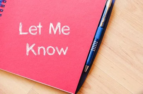 Let me know write on notebook Stock Photos