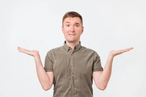 Let me think and select concept. Doubtful pensive man with thoughtful expression Stock Photos