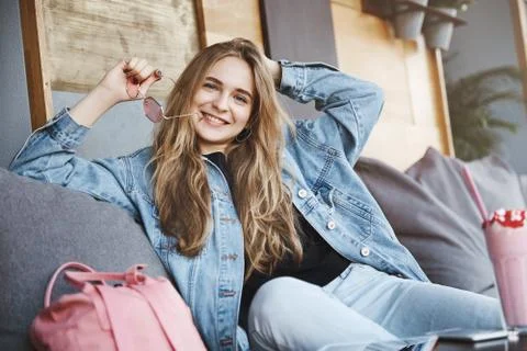 Let us make something fun. Portrait of charming party girl with fair in denim Stock Photos
