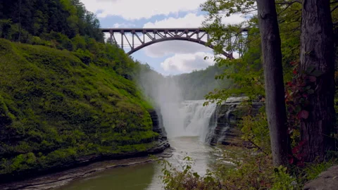 Letchworth State Park with Upper Falls and Bridge Slow Stock Footage 241041586
