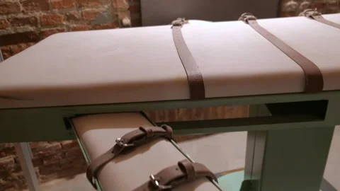 Lethal injection concept. Panoramic over the bed for prisoners Stock Footage 301236091