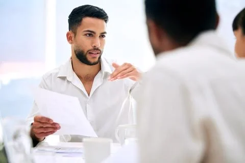 Lets all get on the same level. businesspeople having a meeting in a boardroom Stock Photos
