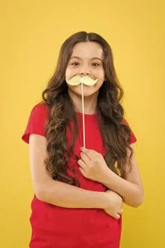 Lets be funny. party elements. happy childhood. small kid yellow background Stock Photos