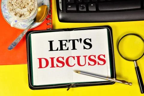 Let's discuss it. Text label in the planning Notepad. Stock Photos