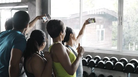 Let's do a group selfie together. Stock Footage 103438776