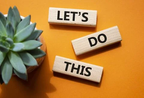 Lets do this symbol. Concept word Lets do this on wooden blocks. Beautiful .. Foto stock