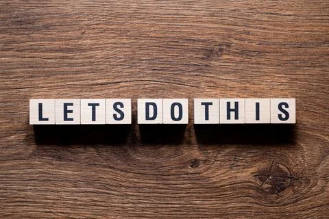 Lets do this - word concept on building blocks, text Fotos de archivo
