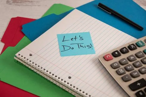 Lets do this written on note pad admin office materials team work message Stock Photos