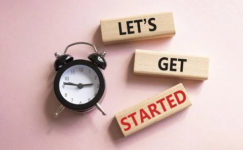 Lets get started symbol. Concept words Lets get started on wooden blocks. B.. 스톡 사진